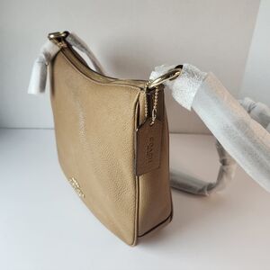 Coach Pebbled Leather Hobo Bag in Saddle